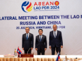 中国俄罗斯老挝首次举行三方外长会晤